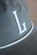 Liberty Barber - “L” Snapback (Light Loden/Cream)